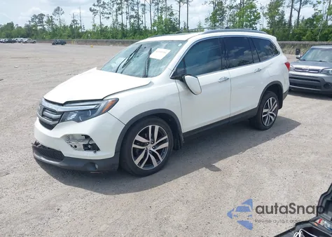 2017 Honda Pilot Touring from USA, damaged, VIN 5FNYF5H91HB032650